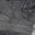 Rescuers spot wreckage possibly from a helicopter that went missing near a volcano in Japan